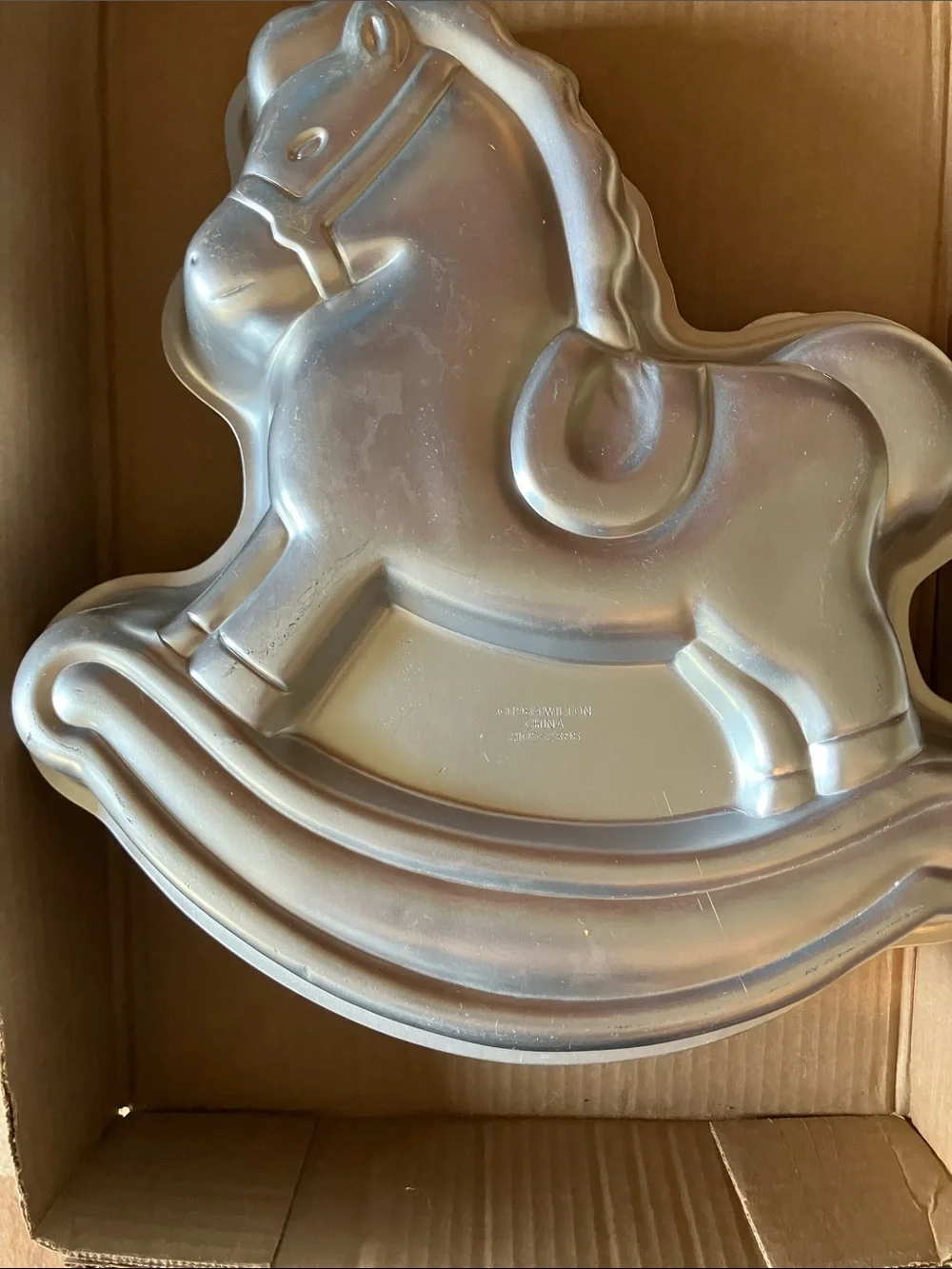 Wilton Rocking Horse Cake Pan with Pink and Gold Accents